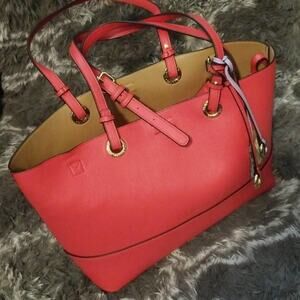 Calvin Klein reversible coral and tan purse‎ bag